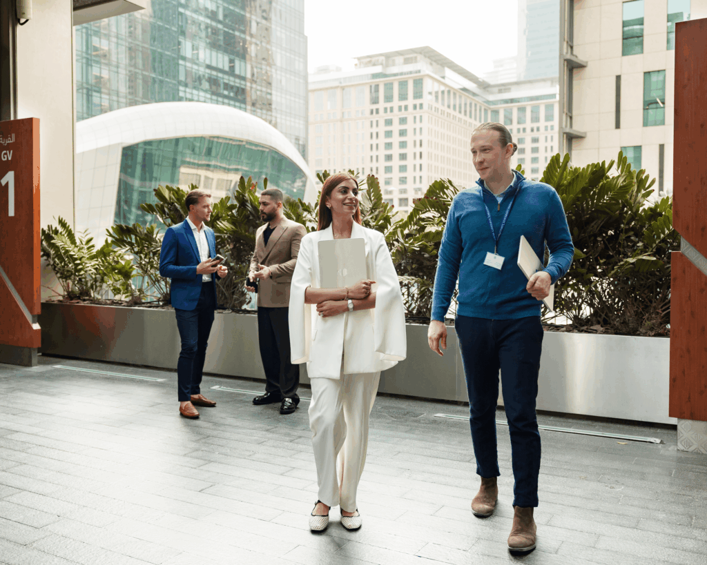 Georgetown Dubai Custom Executive students conversing with each other.